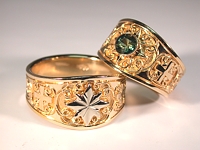 Custom Tapered Celtic Ring with raised star and bezel set green sapphire