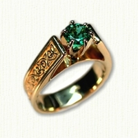 14kt yellow gold 'Bridget' engagement ring set with a round emerald. Ring shank has a triangle knot pattern.