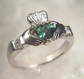 Custom claddagh ring with heart shaped lab created emerald and 2 diamonds
