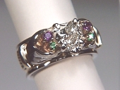 Clare Claddagh ring with a 1.50ct heart shaped diamond, emeralds and amethysts