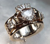 Custom Claddagh ring with a 1.50ct heart shaped diamond and baguette accents