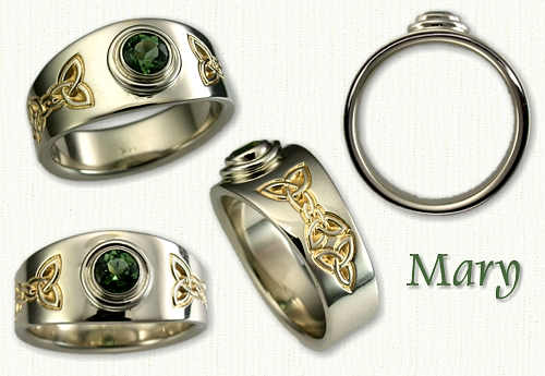 Tapered Mary engagment ring in 14kt white gold with 18kt yellow gold electroplating in the recesses of the triangle knot pattern set with a round bezel set green sapphire.