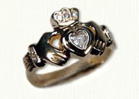 14KY medium claddagh ring with .25ct heart shaped diamond and diamond accents in the cuffs