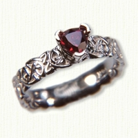 14kt white gold 'Cara' style ring with sculpted triangle knot pattern & trillion ruby